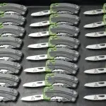 Logos laser engraved on the blades of the Gerber Steady Multitool